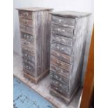 NARROW CHESTS, a pair, grey washed hardwood of ten drawers, 136cm H x 42cm x 48cm.