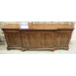 SIDEBOARD, by Charles Barr, Norwich, mahogany of breakfront form with four doors with shaped panels,