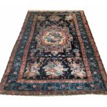 ANTIQUE BAKTHIAR CARPET, Armenian weave of rose and ivory central medallion on sapphire field.