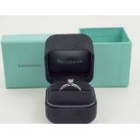 TIFFANY & CO, a fine platinum and princess cut diamond single stone ring,