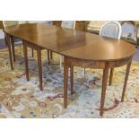 DINING TABLE, George III style mahogany with elliptical ends and drop leaf centre section,