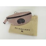 BURBERRY WAIST BAG, dusty pink colour with black zip front closure and logo, adjustable belt,