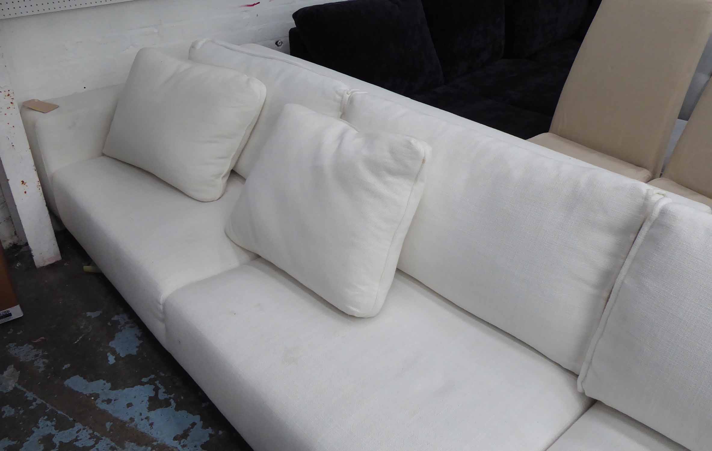 SOFA, by Designers Guild, Model 'Lino', cream on metal supports, in two sections, - Image 2 of 2