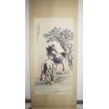 A CHINESE SCROLL PAINTING, of two horses, circa 1930, 133cm x 67cm.