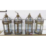 ORANGERY LANTERNS, a set of four, French provincial style gilt finish.