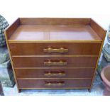 CHEST, mid 20th teak with four drawers with carved feature handles, 90cm W x 46cm D x 82cm H.