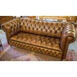 CHESTERFIELD SOFA, Victorian style deep buttoned and rounded back hand finished leaf brown leather,