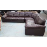 CORNER SOFA, in chocolate brown leather, three sections, on turned supports, 267cm x 213cm.