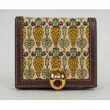 GUCCI WALLET, brown leather with exotic pattern and copper tone closure, coin pocket at the back,