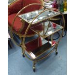 COCKTAIL TROLLEY, French Art Deco style, gilt finish, 95cm H.