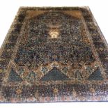 VERY FINE PERSIAN TEHRAN DESIGN RUG, 274cm x 190cm, urn medallion on sapphire field.