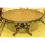 LOO TABLE, Victorian amboyna, ebonised and gilt heightened, circa 1870,