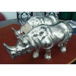 CONTEMPORARY SCHOOL, study of two rhinos, polished metal finish, 23cm H.