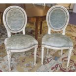 DINING CHAIRS, a set of six, Louis XVI style cream painted with oval backs in green chenille.