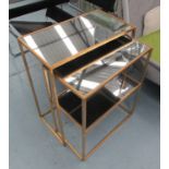 SIDE TABLES, a set of two, 1950's French style gilt finish, one with a shelf below, 67cm H tallest.