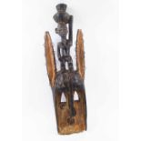 DOGON FACE MASK, Mali, carved wood with whitened detail, 70cm H overall.