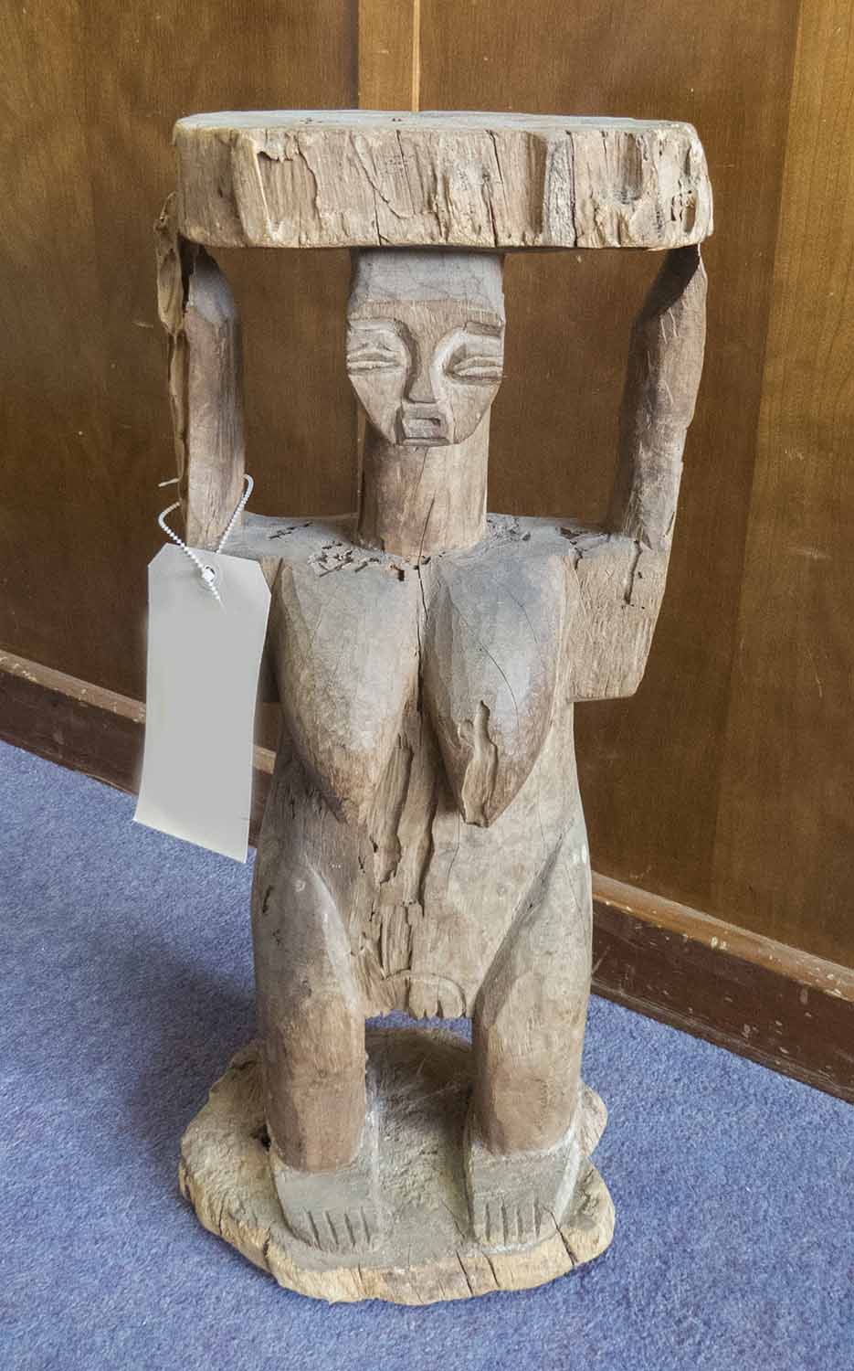 OFFERTORY FIGURE, West African carved wood study of a woman 54.5cm H.