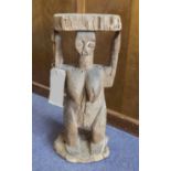 OFFERTORY FIGURE, West African carved wood study of a woman 54.5cm H.