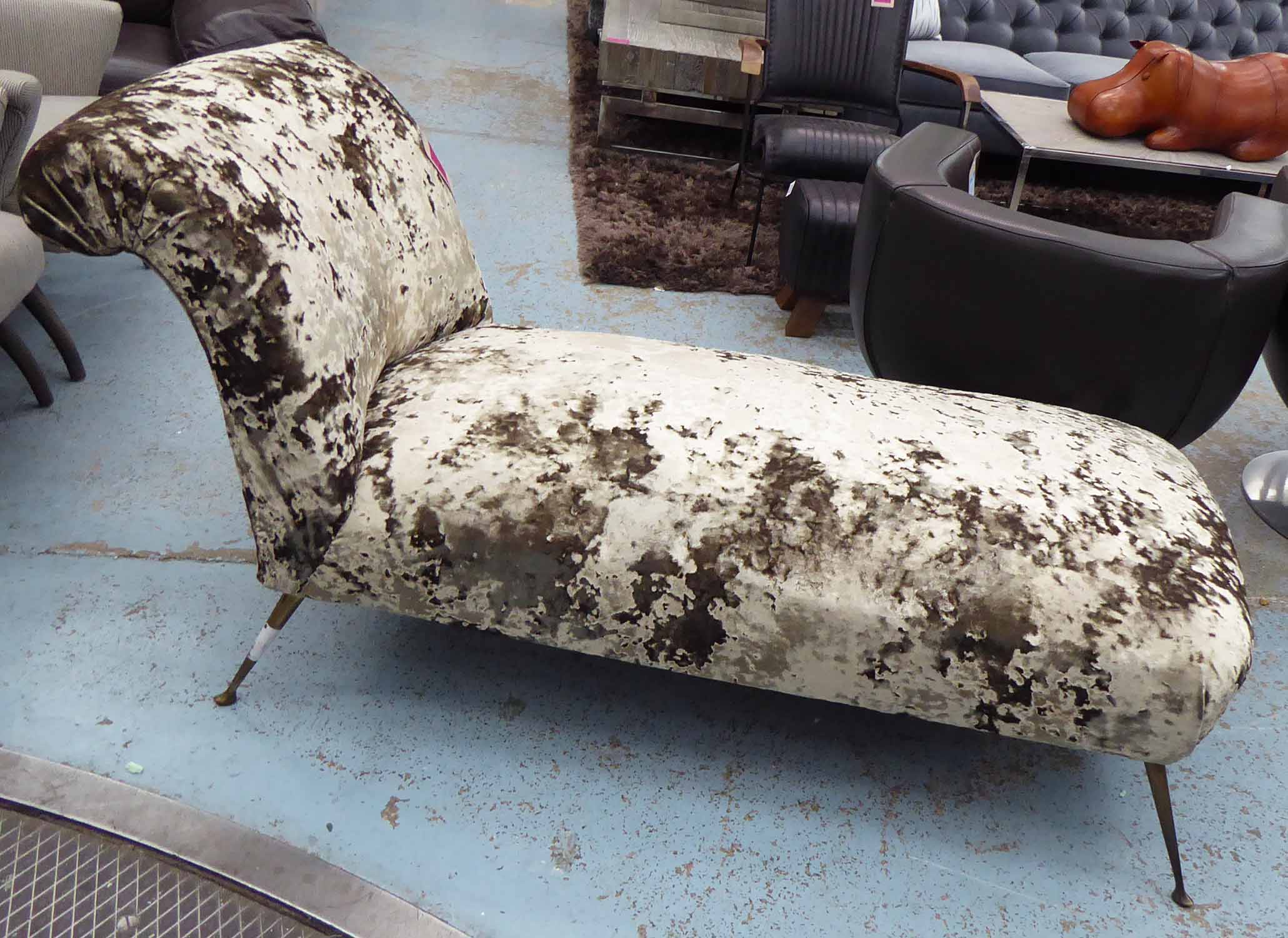 DAYBED, mid 20th century, newly upholstered in shimmering chenille with outsplayed supports,