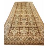 HAND KNOTTED ART NOUVEAU 'GRANADA' DESIGN CARPET, 500cm x 190cm, in natural shades.