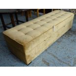 STORAGE OTTOMAN, in pocketed gold fabric with hinged lid, 175cm x 83cm x 50cm H.