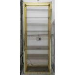 ETAGERE, brass framed with tinted glass shelves, 200cm H x 76cm W x 37cm D.