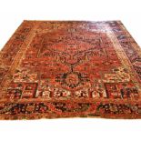 ANTIQUE PERSIAN HERIZ CARPET, 380cm x 285cm.