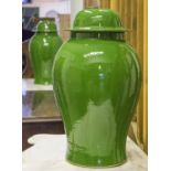 VASES, a pair, Chinese ginger jar form, leaf green with lids, 55cm H.