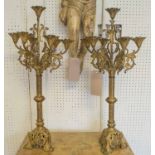 CANDELABRA, a pair of Victorian Gothic gilt brass, 72cm H x 30cm W.