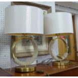 TABLE LAMPS, a pair, circular with glass beads on a brass frame, with shades, 49cm H.