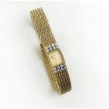 BOUCHERON PARIS, circa 1950, a fine ladies diamond and 18 carat yellow gold back wind wristwatch,