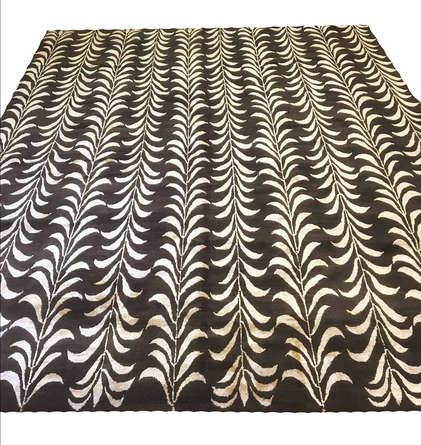 RUG COMPANY 'MOSES BROWN' CARPET, 300cm x 240cm, golden ivory corn leaf design on cocoa field.