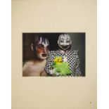 BOY GEORGE with outfit and make-up as a sitter for Ruth Elia, as Leigh Bowery holding a sculpture,