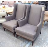 WINGBACK ARMCHAIRS, a pair, from Andrew Martin contemporary style, brown, each 75cm W x 113cm H.