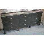 SIDE CABINET, zinc topped on ebonised base with nine drawers, 77cm H x 182cm W.