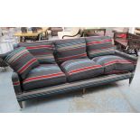 WILLIAM YEOWARD SOFA, three seater, in striped woollen fabric, on square supports with castors,