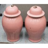 VASES, a pair, Chinese pink glazed ceramic with covers, 52cm H.