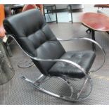 ROCKING CHAIR, in black buttoned leather on chromed metal frame in the style of Mies Van Der Rohr,