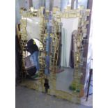 WALL MIRRORS, a pair, amber/gold squares Art Deco style, 57cm x 150cm.