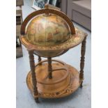'GLOBE' COCKTAIL CABINET, in the form of a terrestrial globe with rising lid and interior fittings,