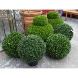 FAUX TOPIARIES, three pairs, including balls.
