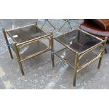 LAMP TABLES, a pair, brass tubular frames with square smoked glass top and lower tier,