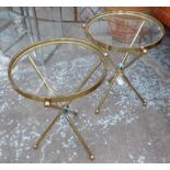 LAMP TABLES, a pair, round glass tops on cross legged brass frame, 41cm diam x 54cm H.