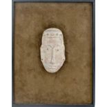 ANTIQUE MEXICAN TERRACOTTA DEITY MASK, later mounted on brown suede, framed.