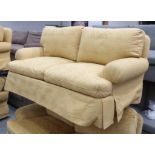 KINGCOME SOFA, two seater, in gold patterned upholstery, 180cm W.