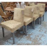 DINING CHAIRS, a set of four, in gold raised patterned upholstery on distressed silvered legs,