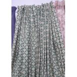 CURTAINS, a pair in a green lattice patterned fabric, lined and interlined,