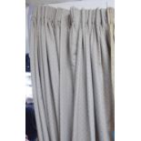 CURTAINS, a pair, in a patterned fabric with a contrasting leading edge, lined and interlined,