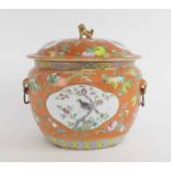 FINE CHINESE CORAL GROUNS BOWL AND COVER, 19th century the ovoid bowl finely decorated with peaches,