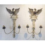 WALL LIGHTS, a pair, Federal style, twin light, each with an ebonised eagle surmount, 63cm H.